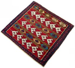 Corner detail of 2000s Shiraz rug showing border pattern and Wool pile