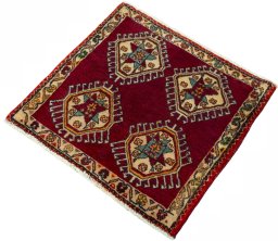 Corner detail of 2000s Shiraz rug showing border pattern and Wool pile