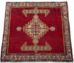 Surface texture of 2000s Shiraz rug with natural Wool and intricate pattern