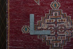 Backside of handmade 2000s Shiraz rug showing knot structure and weave density