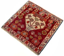 Corner detail of 2000s Shiraz rug showing border pattern and Wool pile