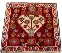 Surface texture of 2000s Shiraz rug with natural Wool and intricate pattern