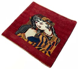 Corner detail of 2000s Shiraz rug showing border pattern and Wool pile