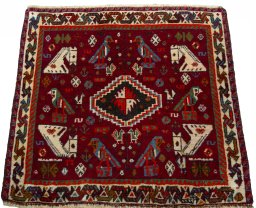 Surface texture of 2000s Shiraz rug with natural Wool and intricate pattern