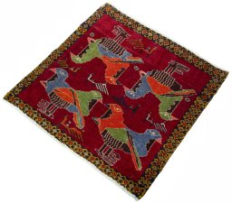 Corner detail of 2000s Shiraz rug showing border pattern and Wool pile