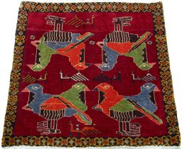 Surface texture of 2000s Shiraz rug with natural Wool and intricate pattern