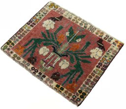 Corner detail of 2000s Shiraz rug showing border pattern and Wool pile
