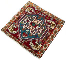 Corner detail of 2000s Shiraz rug showing border pattern and Wool pile