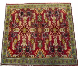 Surface texture of 2000s Shiraz rug with natural Wool and intricate pattern