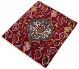 Corner detail of 2000s Shiraz rug showing border pattern and Wool pile