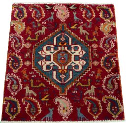 Surface texture of 2000s Shiraz rug with natural Wool and intricate pattern