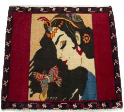 Surface texture of 2000s Shiraz rug with natural Wool and intricate pattern