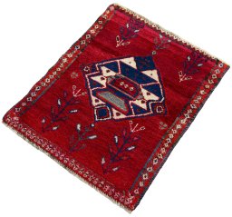Corner detail of 2000s Shiraz rug showing border pattern and Wool pile