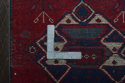 Backside of handmade 2000s Shiraz rug showing knot structure and weave density