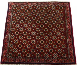 Surface texture of 2000s Shiraz rug with natural Wool and intricate pattern