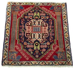 Surface texture of 2000s Shiraz rug with natural Wool and intricate pattern