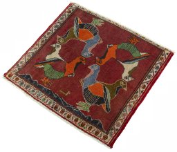 Corner detail of 2000s Shiraz rug showing border pattern and Wool pile