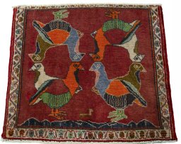 Surface texture of 2000s Shiraz rug with natural Wool and intricate pattern