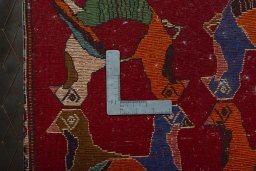 Backside of handmade 2000s Shiraz rug showing knot structure and weave density