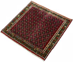 Corner detail of 2000s Shiraz rug showing border pattern and Wool pile
