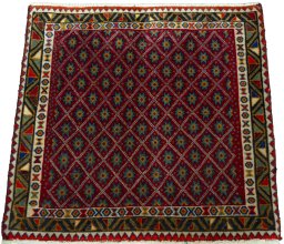 Surface texture of 2000s Shiraz rug with natural Wool and intricate pattern