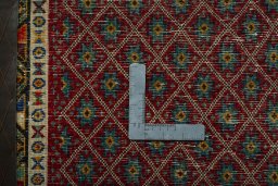 Backside of handmade 2000s Shiraz rug showing knot structure and weave density