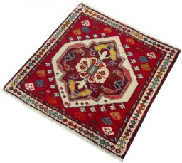 Corner detail of 2000s Shiraz rug showing border pattern and Wool pile
