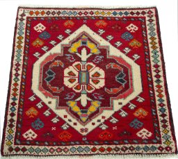 Surface texture of 2000s Shiraz rug with natural Wool and intricate pattern