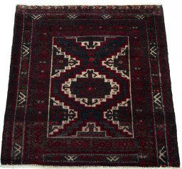 Surface texture of 2000s Shiraz rug with natural Wool and intricate pattern