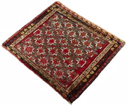Corner detail of 2000s Shiraz rug showing border pattern and Wool pile