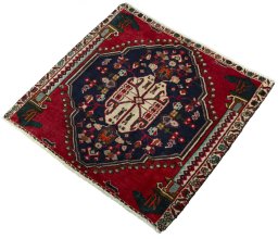 Corner detail of 2000s Shiraz rug showing border pattern and Wool pile