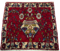 Surface texture of 2000s Shiraz rug with natural Wool and intricate pattern