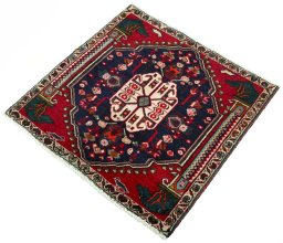 Corner detail of 2000s Shiraz rug showing border pattern and Wool pile