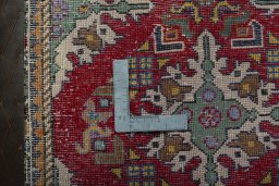 Backside of handmade 2000s Shiraz rug showing knot structure and weave density
