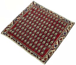 Corner detail of 2000s Shiraz rug showing border pattern and Wool pile