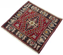 Corner detail of 2000s Shiraz rug showing border pattern and Wool pile