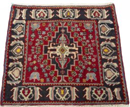 Surface texture of 2000s Shiraz rug with natural Wool and intricate pattern