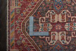 Backside of handmade 2000s Shiraz rug showing knot structure and weave density