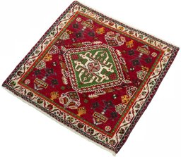 Corner detail of 2000s Shiraz rug showing border pattern and Wool pile