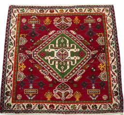 Surface texture of 2000s Shiraz rug with natural Wool and intricate pattern
