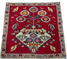 Surface texture of 2000s Shiraz rug with natural Wool and intricate pattern