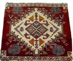 Surface texture of 2000s Shiraz rug with natural Wool and intricate pattern