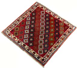 Corner detail of 2000s Shiraz rug showing border pattern and Wool pile
