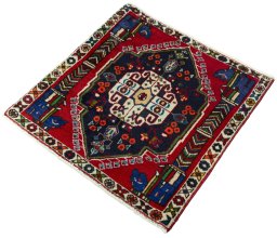 Corner detail of 2000s Shiraz rug showing border pattern and Wool pile
