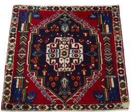 Surface texture of 2000s Shiraz rug with natural Wool and intricate pattern