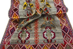 Corner detail of 1970s Shiraz rug showing border pattern and Wool pile
