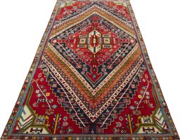 Surface texture of 1970s Shiraz rug with natural Wool and intricate pattern