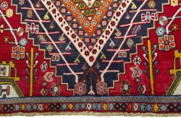 Close-up detail of 1970s Shiraz rug from Iran / Persia showing Wool weave