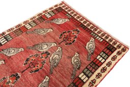 Surface texture of 2000s Shiraz rug with natural Wool and intricate pattern