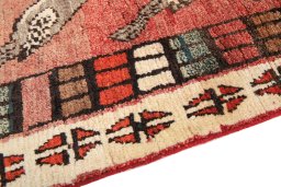Backside of handmade 2000s Shiraz rug showing knot structure and weave density